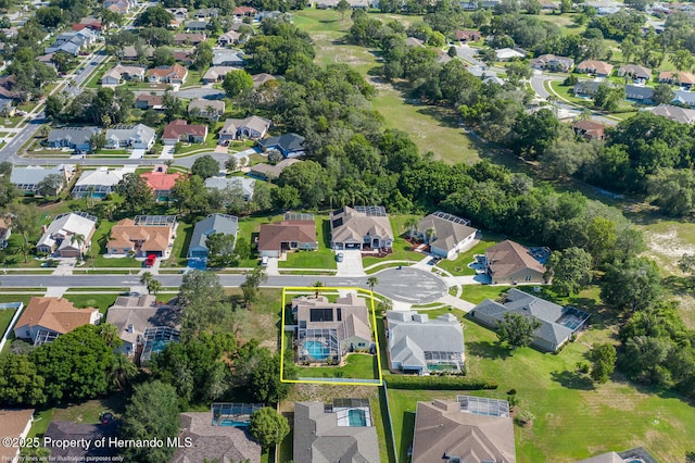 1049 Larkin Rd, Spring Hill, FL 34608 - aerial overview of property's location featuring nearby suburban area and property parcel outlined