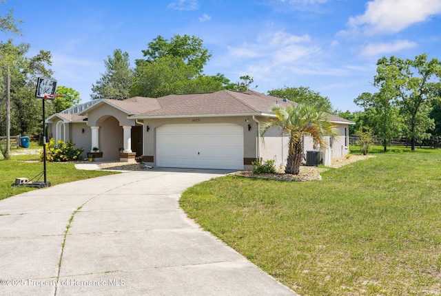 14031 Hexam Rd, Brooksville, FL 34613 - ranch-style house featuring stucco siding, driveway, an attached garage, and a front yard