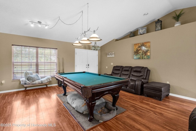 14031 Hexam Rd, Brooksville, FL 34613 - recreation room featuring lofted ceiling, billiards table, wood finished floors, and baseboards