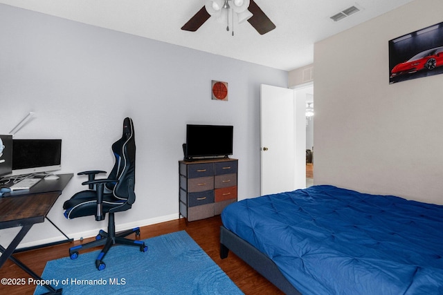 14031 Hexam Rd, Brooksville, FL 34613 - bedroom featuring wood finished floors, an office area, and ceiling fan