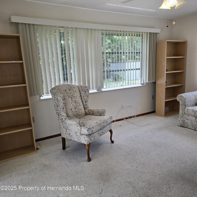 2226 Giralda Ave, Spring Hill, FL 34606 - sitting room with carpet, baseboards, and a ceiling fan