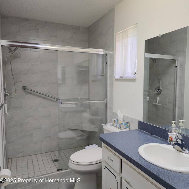 2226 Giralda Ave, Spring Hill, FL 34606 - bathroom featuring vanity, toilet, and a shower stall