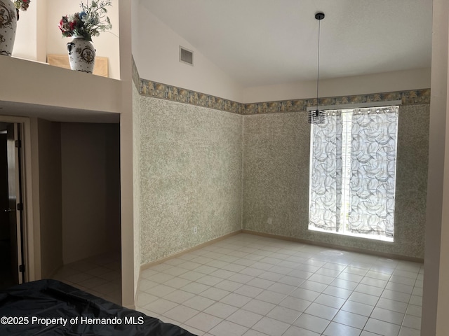 24 Black Willow Ct N, Homosassa, FL 34446 - unfurnished dining area with tile patterned floors and vaulted ceiling
