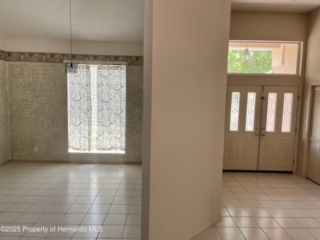 24 Black Willow Ct N, Homosassa, FL 34446 - foyer entrance featuring tile patterned floors and baseboards