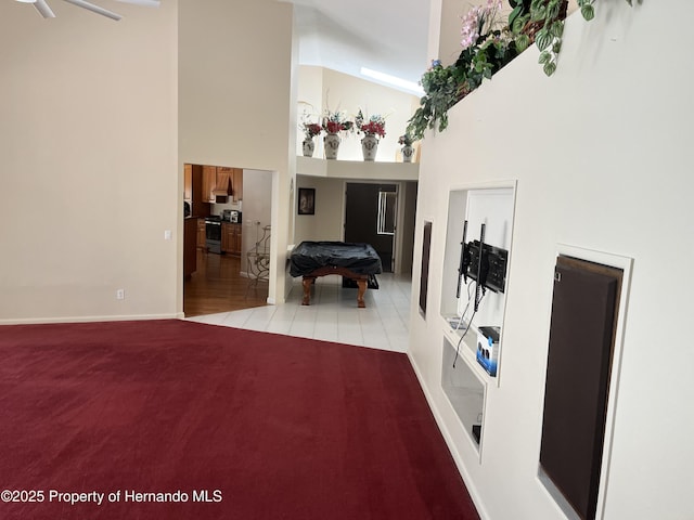 24 Black Willow Ct N, Homosassa, FL 34446 - entryway with a high ceiling, light carpet, pool table, and baseboards
