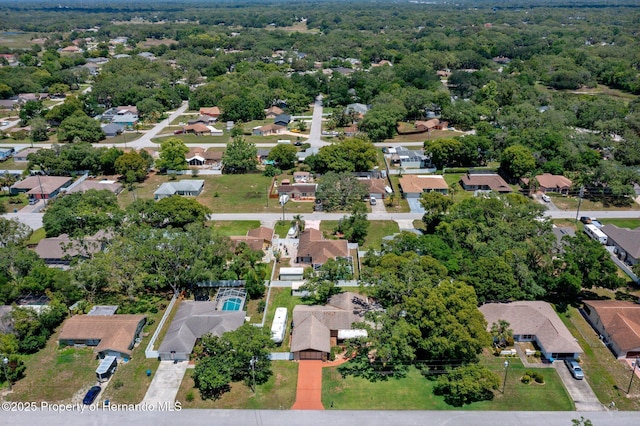 7630 Landmark Dr, Spring Hill, FL 34606 - aerial overview of property's location with nearby suburban area