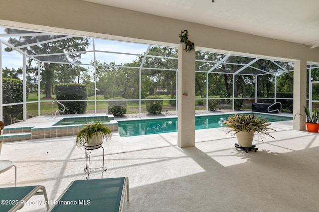 5182 Championship Cup Ln, Spring Hill, FL 34609 - outdoor pool featuring an in-ground hot tub, a lanai, and a patio