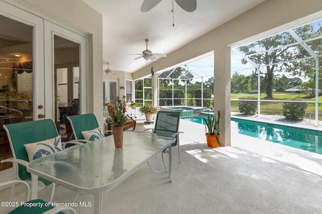 5182 Championship Cup Ln, Spring Hill, FL 34609 - sunroom with a jacuzzi, a ceiling fan, and a swimming pool
