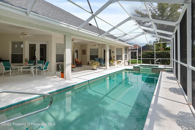 5182 Championship Cup Ln, Spring Hill, FL 34609 - view of pool featuring ceiling fan, a patio area, a pool with connected hot tub, and a lanai
