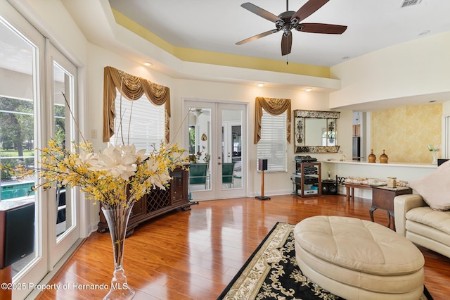 5182 Championship Cup Ln, Spring Hill, FL 34609 - living area featuring ceiling fan, wood finished floors, and french doors