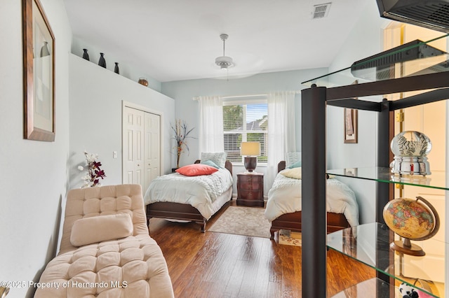5182 Championship Cup Ln, Spring Hill, FL 34609 - bedroom featuring wood finished floors and a closet