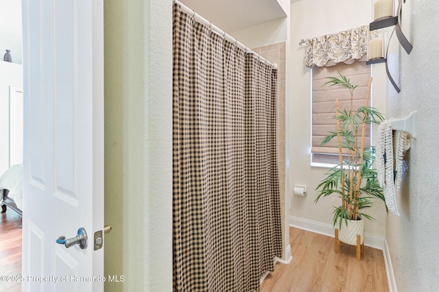 5182 Championship Cup Ln, Spring Hill, FL 34609 - detailed view of wood finished floors and baseboards