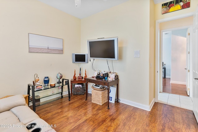 5182 Championship Cup Ln, Spring Hill, FL 34609 - living area with a ceiling fan, baseboards, and wood finished floors