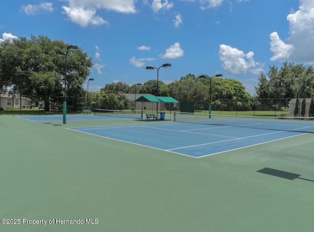 5182 Championship Cup Ln, Spring Hill, FL 34609 - view of tennis court with community basketball court