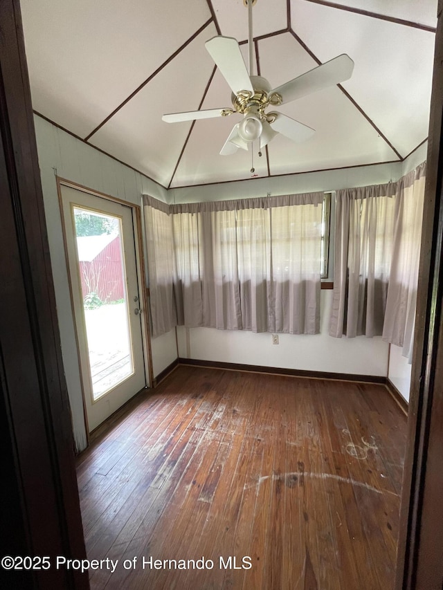 15306 Spokane Rd, Spring Hill Pasco, FL 34610 - unfurnished sunroom featuring lofted ceiling