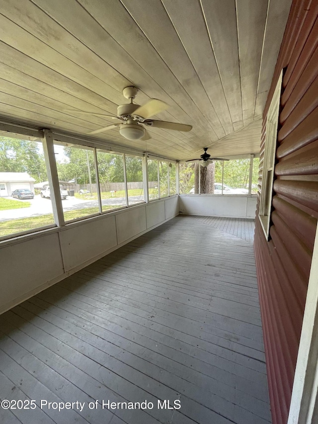 15306 Spokane Rd, Spring Hill Pasco, FL 34610 - unfurnished sunroom with a ceiling fan