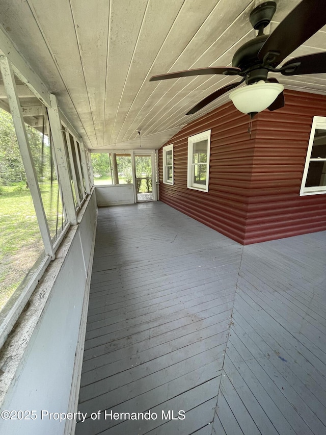 15306 Spokane Rd, Spring Hill Pasco, FL 34610 - unfurnished sunroom featuring vaulted ceiling and ceiling fan