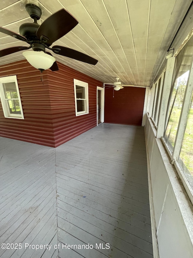 15306 Spokane Rd, Spring Hill Pasco, FL 34610 - unfurnished sunroom with a ceiling fan