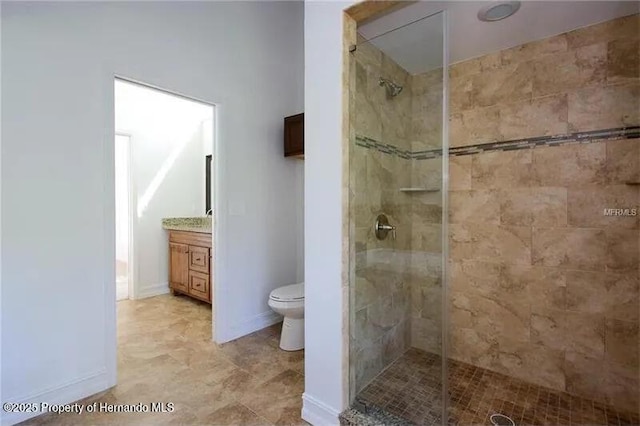39127 Pretty Pond Rd, Zephyrhills, FL 33540 - bathroom featuring a stall shower, toilet, and vanity