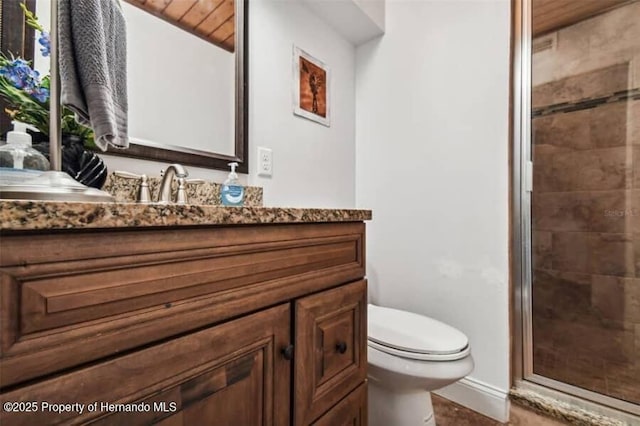 39127 Pretty Pond Rd, Zephyrhills, FL 33540 - bathroom featuring vanity, a stall shower, and toilet