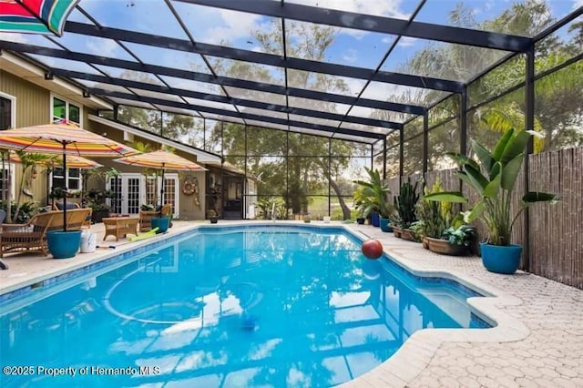 39127 Pretty Pond Rd, Zephyrhills, FL 33540 - swimming pool with a patio and glass enclosure