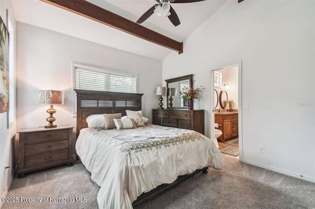 39127 Pretty Pond Rd, Zephyrhills, FL 33540 - bedroom featuring light carpet, ensuite bath, baseboards, and ceiling fan