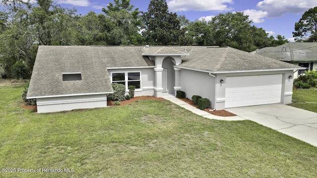 13406 Banyan Rd, Spring Hill, FL 34609 - single story home featuring a shingled roof, a garage, stucco siding, and a front yard