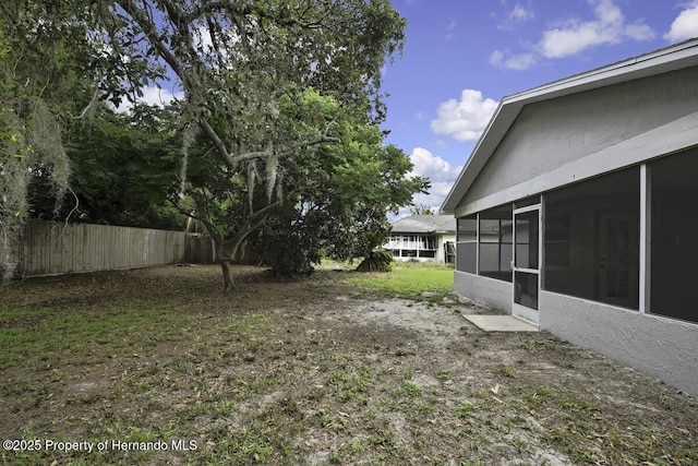 13406 Banyan Rd, Spring Hill, FL 34609 - view of yard with a sunroom