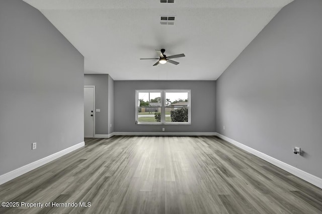 13406 Banyan Rd, Spring Hill, FL 34609 - unfurnished room with a ceiling fan, wood finished floors, and baseboards