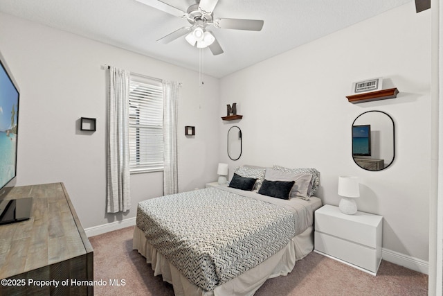 18620 Rococo Rd, Spring Hill Pasco, FL 34610 - carpeted bedroom with baseboards and a ceiling fan