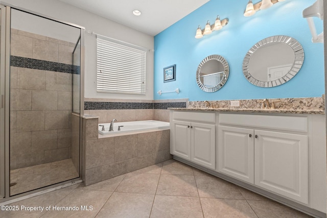 18620 Rococo Rd, Spring Hill Pasco, FL 34610 - full bathroom with a shower stall, double vanity, a garden tub, tile patterned flooring, and recessed lighting