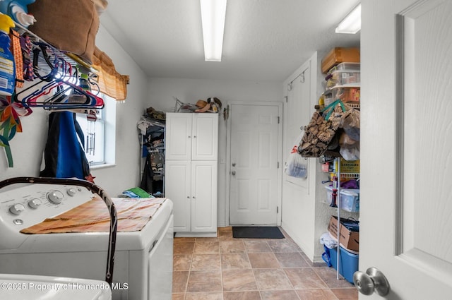 10457 Cranston St, Spring Hill, FL 34608 - washroom with cabinet space and washer and clothes dryer
