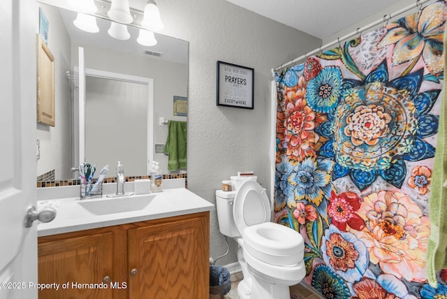 10457 Cranston St, Spring Hill, FL 34608 - bathroom featuring a textured wall, vanity, toilet, and a shower with shower curtain