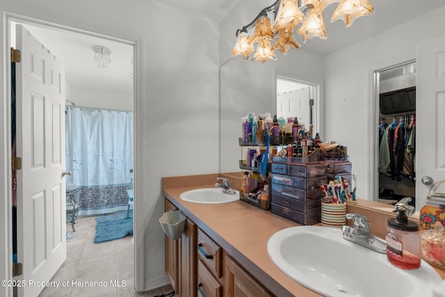 10457 Cranston St, Spring Hill, FL 34608 - full bathroom with a chandelier, tile patterned flooring, double vanity, and curtained shower