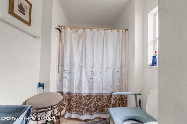 10457 Cranston St, Spring Hill, FL 34608 - bathroom with a shower with curtain and toilet