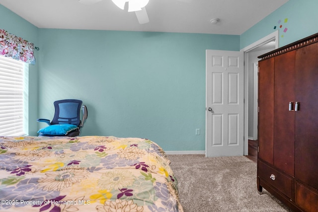 10457 Cranston St, Spring Hill, FL 34608 - bedroom with carpet floors, ceiling fan, and baseboards