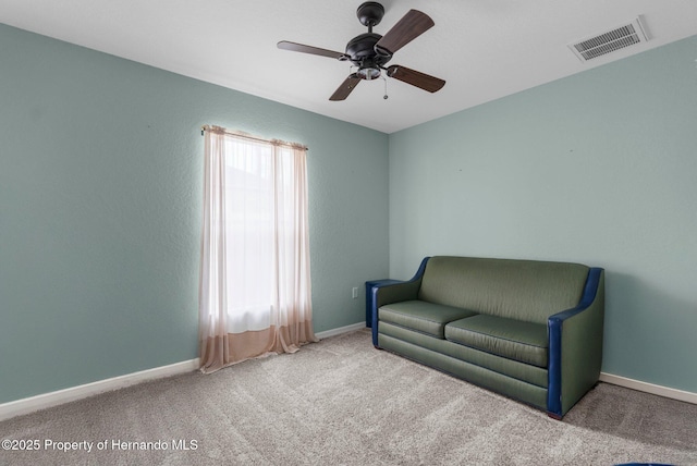 10457 Cranston St, Spring Hill, FL 34608 - sitting room with carpet, ceiling fan, and baseboards
