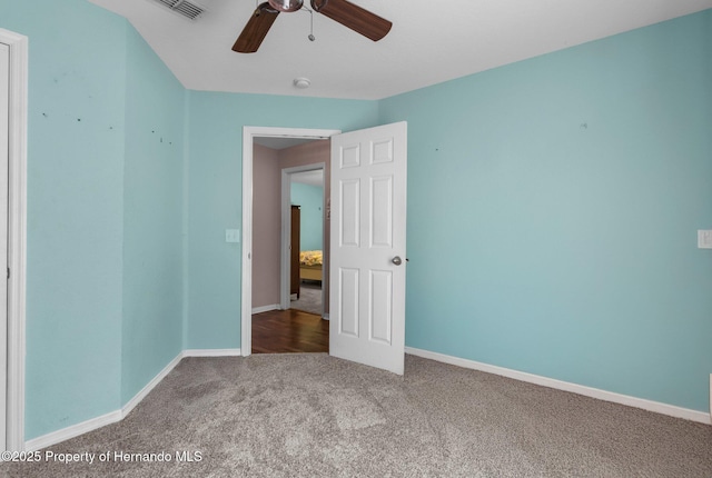 10457 Cranston St, Spring Hill, FL 34608 - unfurnished bedroom with carpet floors, baseboards, and a ceiling fan