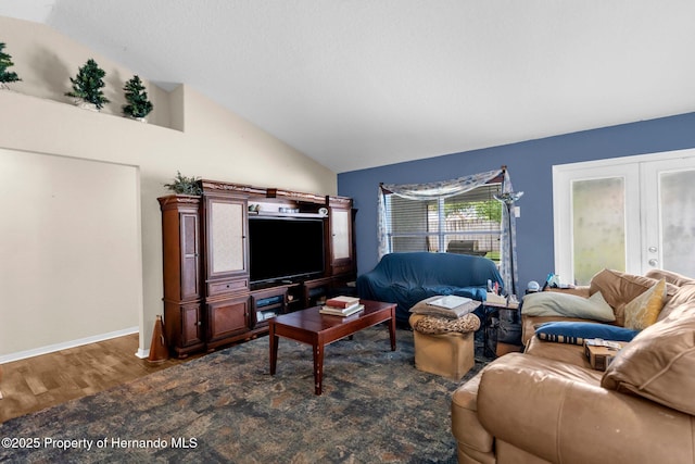 10457 Cranston St, Spring Hill, FL 34608 - living area featuring vaulted ceiling, french doors, and dark wood finished floors