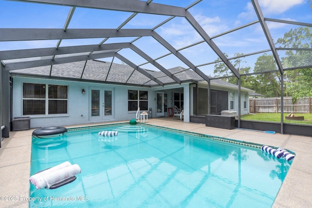 10457 Cranston St, Spring Hill, FL 34608 - view of pool featuring french doors, a patio, and a lanai