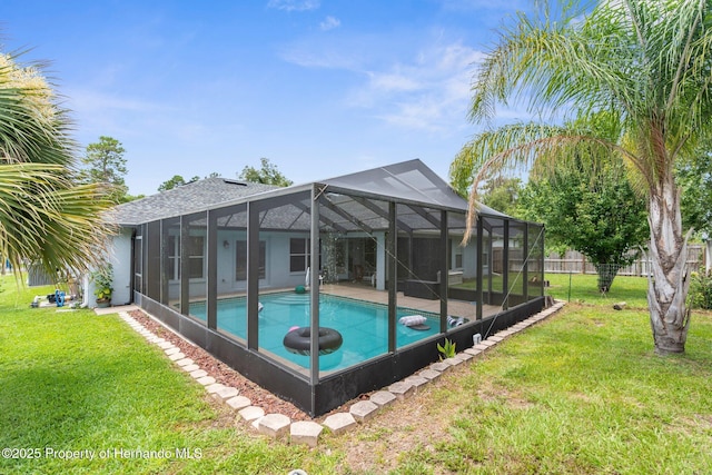 10457 Cranston St, Spring Hill, FL 34608 - view of pool with glass enclosure and a patio