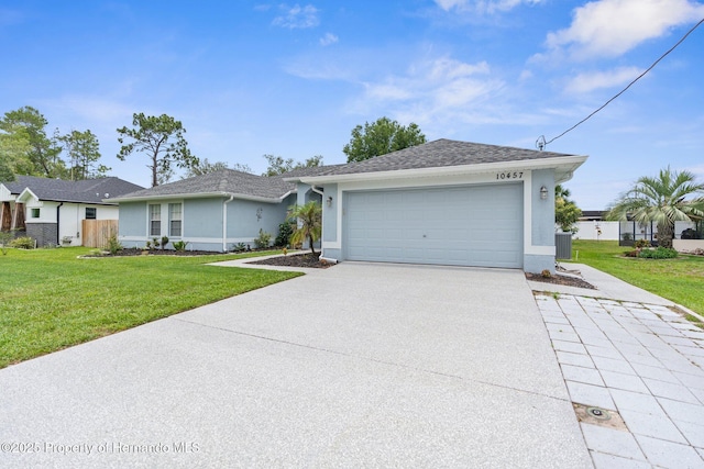 10457 Cranston St, Spring Hill, FL 34608 - single story home with driveway, stucco siding, a garage, and central air condition unit