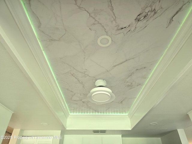 2429 Birdie Ln, Spring Hill, FL 34606 - detailed view of a raised ceiling and ornamental molding