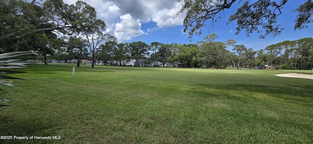 2429 Birdie Ln, Spring Hill, FL 34606 - view of community with a lawn and view of golf course