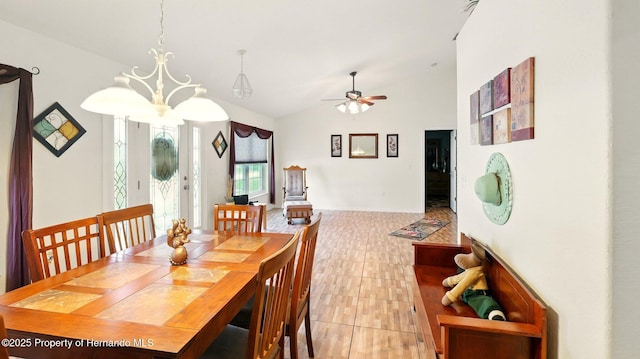 15348 Glossy Ibis Rd, Brooksville, FL 34614 - dining space featuring a ceiling fan, lofted ceiling, and a chandelier
