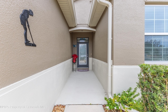 17679 Garsalaso Cir, Brooksville, FL 34604 - property entrance with stucco siding