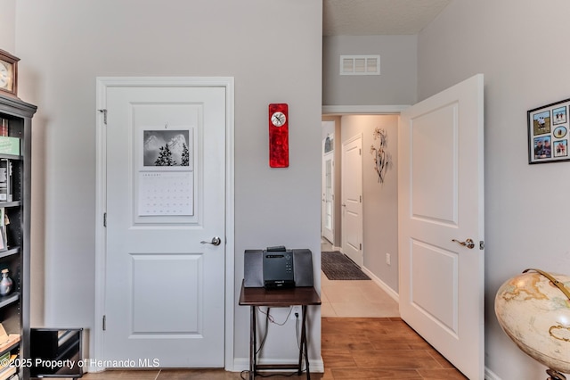 17679 Garsalaso Cir, Brooksville, FL 34604 - hallway with wood finished floors