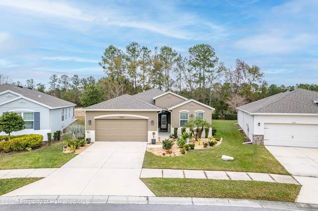 17679 Garsalaso Cir, Brooksville, FL 34604 - single story home with concrete driveway, a garage, a front yard, and stucco siding