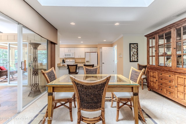 2481 Whispering Pines Ct, Spring Hill, FL 34606 - dining area with a skylight, crown molding, light tile patterned flooring, recessed lighting, and baseboards