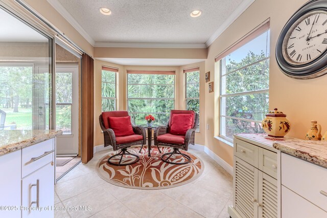 2481 Whispering Pines Ct, Spring Hill, FL 34606 - sitting room featuring a textured ceiling, crown molding, light tile patterned floors, baseboards, and recessed lighting